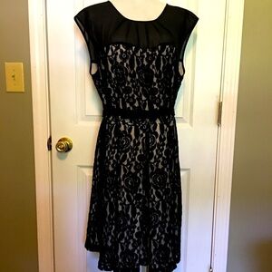 Just Taylor dress 16. Black crochet rose detail over contrasting lining.